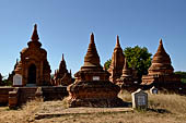 The cluster of red brick temples, named Khay-min-gha on the map on the North plain of Bagan. Myanmar. 